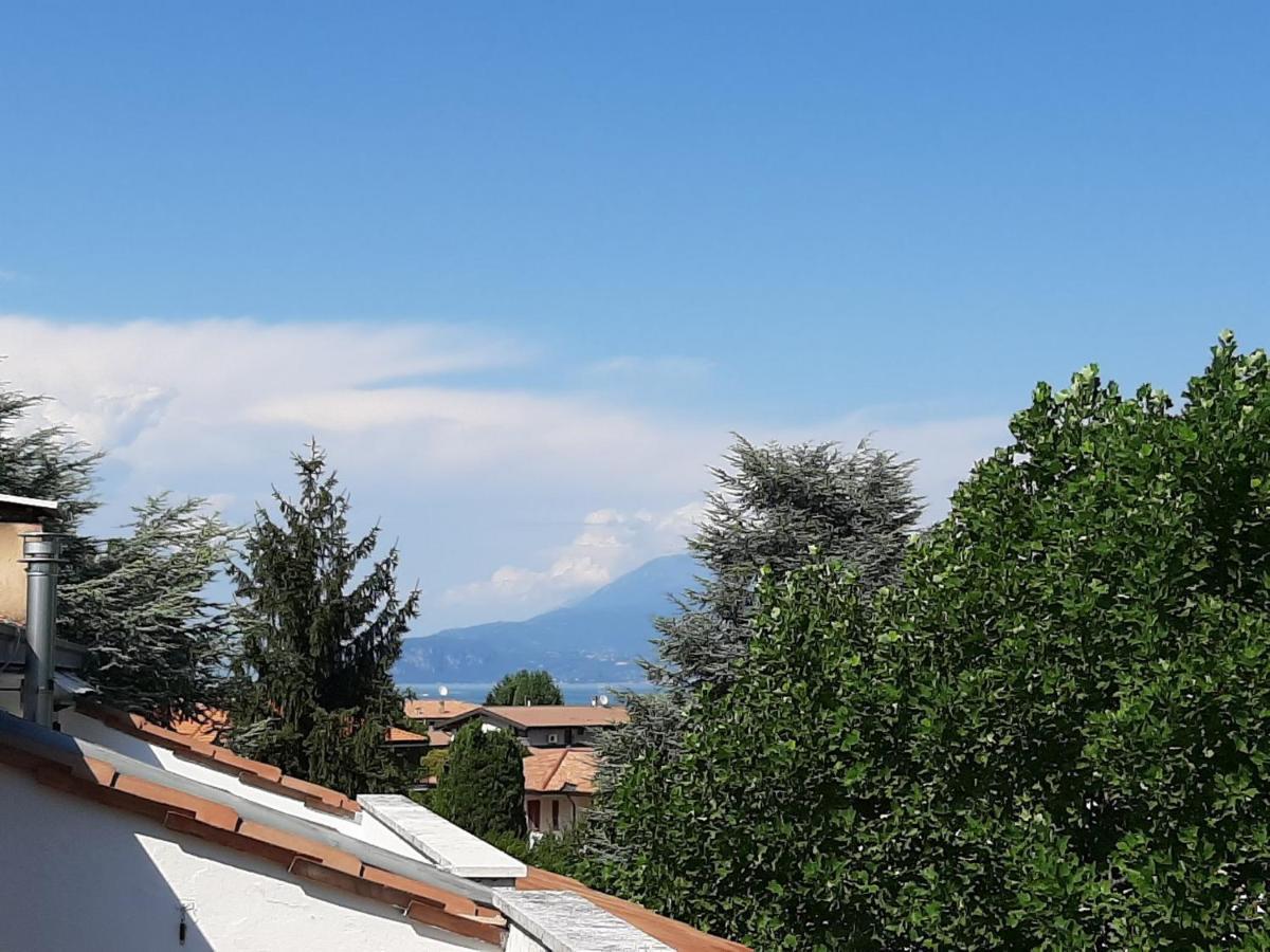 Appartamento Genziana - Con Vista Piscina E Garage 西尔米奥奈 外观 照片